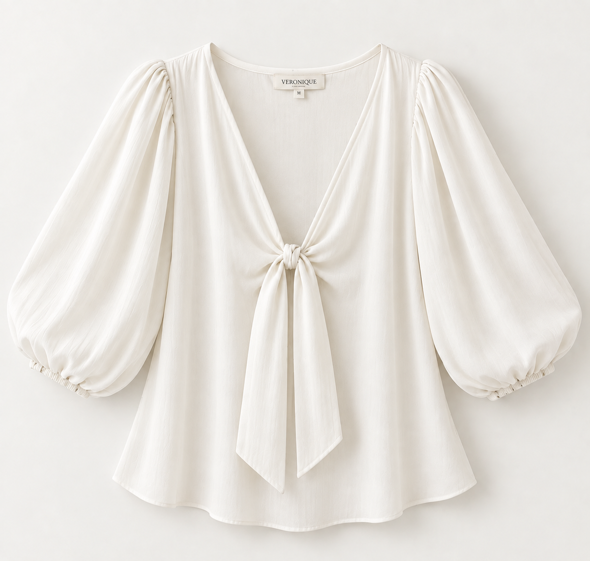 Blusa Margaux marfil manga globo y lazo